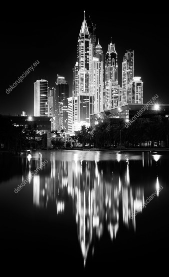 Wzornik czarno-białej fototapety w nowoczesnym designe z wieżowcami Dubai Marina nocą. Fototapeta miasta świetnie sprawdzi się w pokoju dziennym, salonie, sypialni, przedpokoju, jadalni, biurze oraz pokoju młodzieżowym.