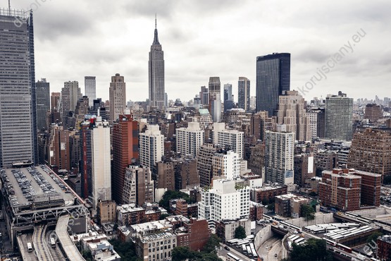 Wzornik fototapety z widokiem na wysokie wieżowce Nowego Yorku w USA. Fototapeta do pokoju dziennego, młodzieżowego, sypialni, salonu, biura, gabinetu, przedpokoju i jadalni.