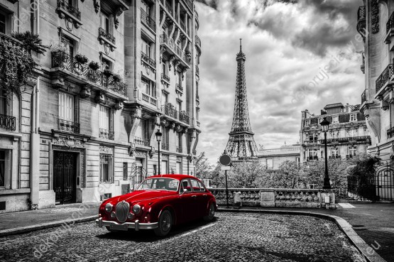 Wzornik, czarno-biała fototapeta z czerwoną, retro limuzyną, na ulicy Paryża z widokiem na wieżę Eiffla, we Francja. Nowoczesna fototapety świetnie sprawdzi się w pokoju dziennym, młodzieżowym, salonie, sypialni, przedpokoju, jadalni, biurze, gabinecie oraz pokoju młodzieżowym.