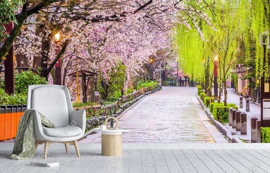 Wizualizacja, piękna aleja kwitnących drzew wiosną, w japońskiej miejscowości, będzie pięknie prezentować się na ścianie salonu, sypialni, jadalni, biura, przedpokoju. Fototapeta optycznie powiększająca pomieszczenie.