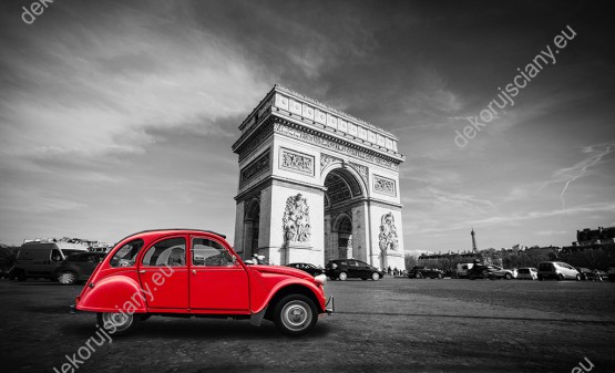 Wzornik fototapety przedstawia czerwony samochód-garbus na ulicach Paryża z Łukiem Triumfalnym w tle. Fototapeta do pokoju dziennego, młodzieżowego, salonu, biura, gabinetu, sypialni, przedpokoju i jadalni.