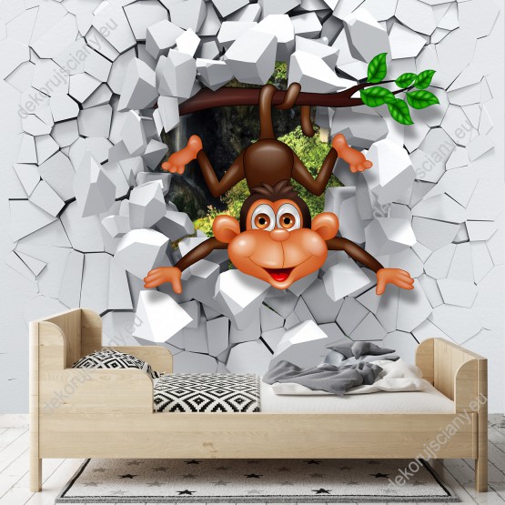 Wizualizacja fototapety z efektem 3D przedstawia małpkę zaglądającą przez szarą, rozbitą ścianę. Fototapeta do pokoju dziecięcego i młodzieżowego.