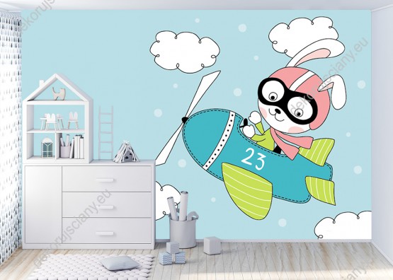 Wizualizacja fototapety do pokoju dziecięcego z królikiem w roli pilota lecącego samolotem.