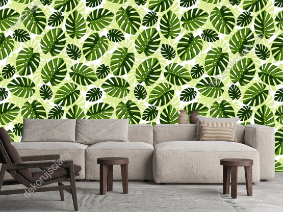 Wizualizacja tapety do pokoju dziennego, sypialni, salonu, przedpokoju, biura z motywem tropikalnym. Wzór tapety w duże, zielone liście egzotycznych roślin, na białym tle.