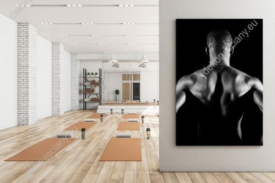 Wizualizacja, obraz z mężczyzną o wyrzeźbionej sylwetce, na czarnym tle. Obraz do biura, sypialni, gabinetu, siłowni.