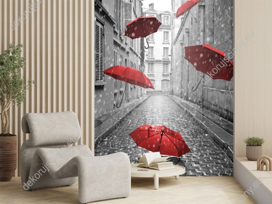Wizualizacja fototapety w nowoczesnym stylu do sypialni, salonu, przedpokoju, biura, gabinetu, pokoju młodzieżowego. Fototapeta przedstawia ulice miasta w czasie pory deszczowej i spadające, czerwone parasole.