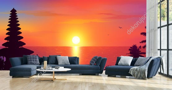 Wizualizacja fototapety z widokiem na tradycyjna balijska świątynie i drzewa palm na tle morza w barwach zachodzącego słońca. Fototapeta do pokoju dziennego, młodzieżowego, salonu, biura, gabinetu, sypialni, przedpokoju i jadalni.