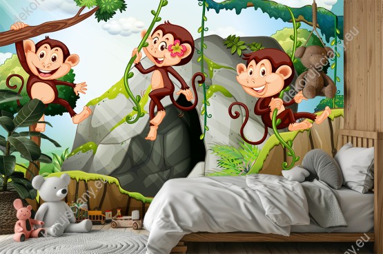 Wizualizacja fototapety do pokoju dziecięcego z trzema psotnymi małpkami huśtającymi się na lianach w dżungli.