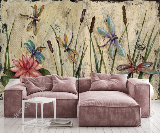 Wizualizacja fototapety przedstawia kolorowe ważki latające pośród roślin. Rodzaj takiej fototapety świetnie sprawdzi się w pokoju dziennym, salonie, sypialni, przedpokoju, jadalni, oraz pokoju młodzieżowym i dziecięcym.