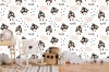 Wizualizacja tapety na ścianę do pokoju dziecięcego. Wzór tapety przedstawia ciekawe sowy z dużymi oczami. Tapeta w kremowo-czarnych kolorach, na białym tle w różne wzory.