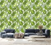 Wizualizacja tapety do pokoju dziennego, sypialni, salonu, przedpokoju, biura z motywem egzotycznym. Tapeta przedstawia zielone liście palm, na białym tle.