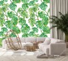 Wizualizacja tapety z motywem tropikalnym. Tapeta przedstawia zielone liście egzotycznych roślin, na białym tle.