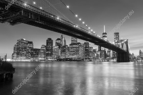 Wzornik, czarnobiała fototapeta z mostem Brooklyńskim nocą w Nowy Jork. Nowoczesna fototapeta świetnie sprawdzi się w pokoju dziennym, salonie, sypialni, przedpokoju, jadalni, biurze oraz pokoju młodzieżowym.