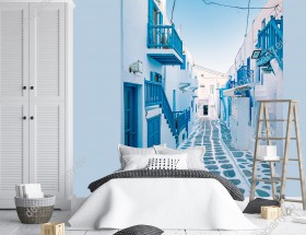 Wizualizacja, fototapeta z widokiem na białoniebieskie uliczki słonecznej Grecji. Fototapeta do pokoju dziennego, sypialni, salonu, biura, gabinetu, przedpokoju i jadalni.