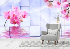 Wizualizacja fototapety przedstawia gałązki różowych kwiatów orchidei odbijające się lustrze wody, utworzonej przez sześciany dające w całości efekt 3D. Fototapeta do pokoju dziennego, młodzieżowego, sypialni, salonu, biura, gabinetu, przedpokoju i jadalni.