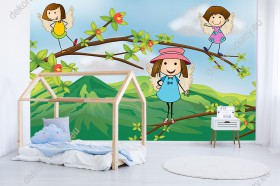 Wizualizacja fototapety do pokoju dziecięcego z małymi aniołkami bawiącymi się na gałęziach drzew.